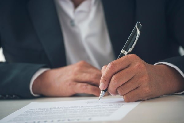 shutterstock_2286997163 - Family Law Bridging - Separation Agreement-600 Separation agreement being finalised with legal guidance in Scotland